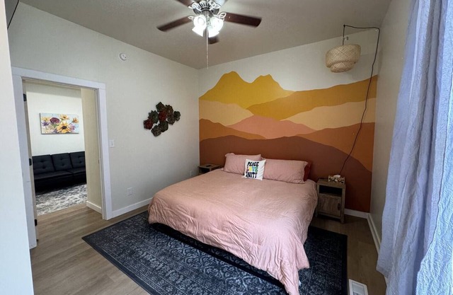 Spacious king-bed apartment with endless hot water. Only blocks from downtown!