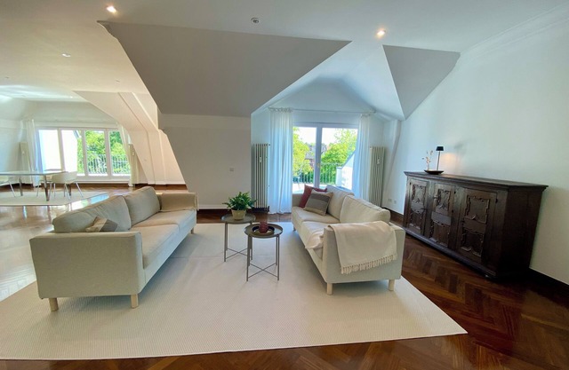 Spacious, light-flooded loft apartment with 2 terraces and views of the countryside