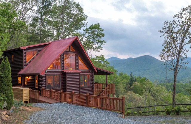 Spacious log cabin with spectacular mountain views - private hot tub & sauna