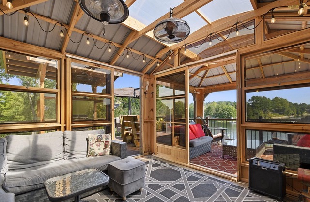 Spacious modern waterfront cottage with private beachfront