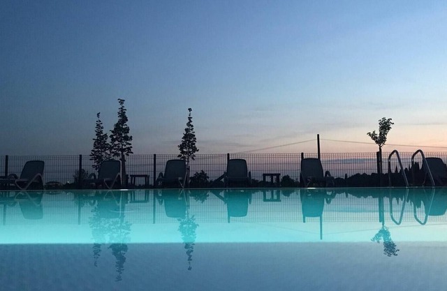 Spacious mobile homes overlooking the pool