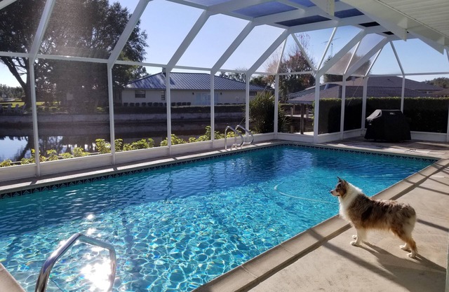 Spacious pool home on corner canal lot to Lake June