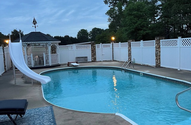 Spacious ranch-style home with tranquil pool and multiple entertainment areas