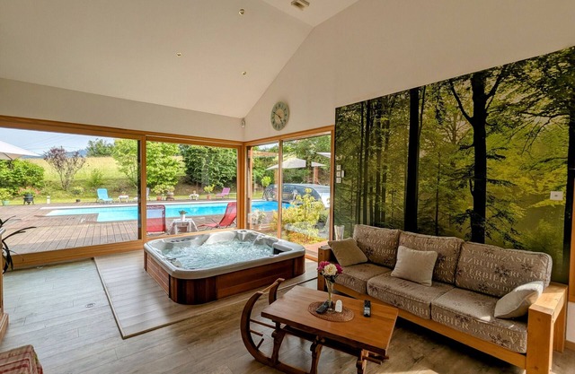 Spacious room with balcony and heated pool access