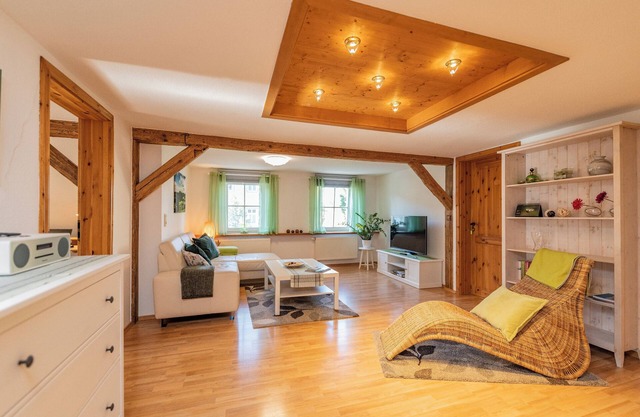 Spacious top floor with half-timbered flair and far-reaching views for 4