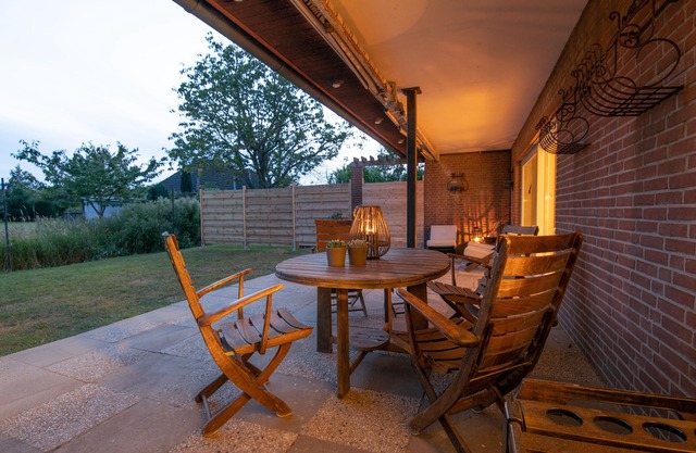 Spacious vacation apartment with garden, surrounded by greenery.