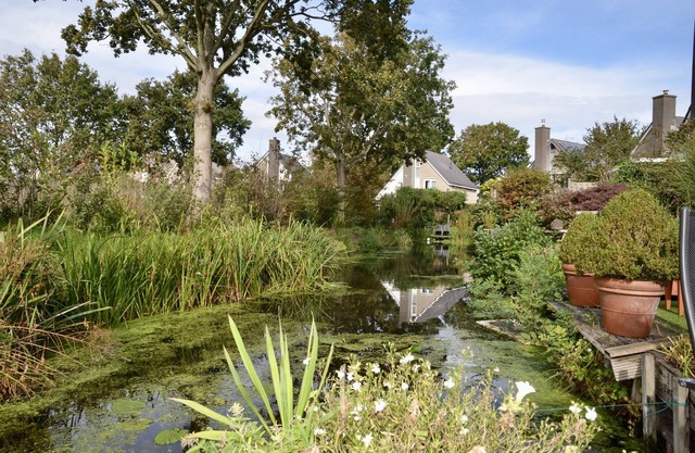 Spacious vacation home with a beautiful garden by the water.