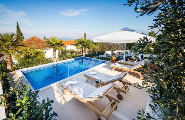 Spacious villa with private pool, 100m to beach sea views, terraces and gardens