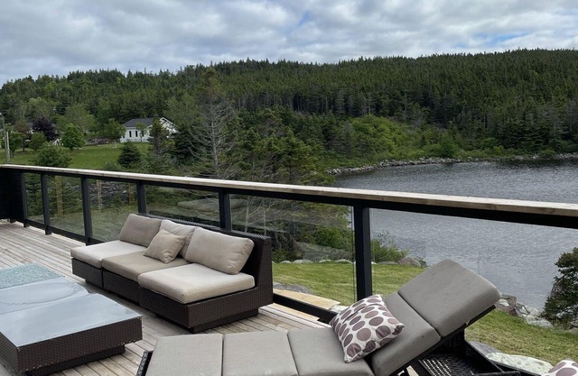Spacious waterfront property next to Golf course and walking trails.