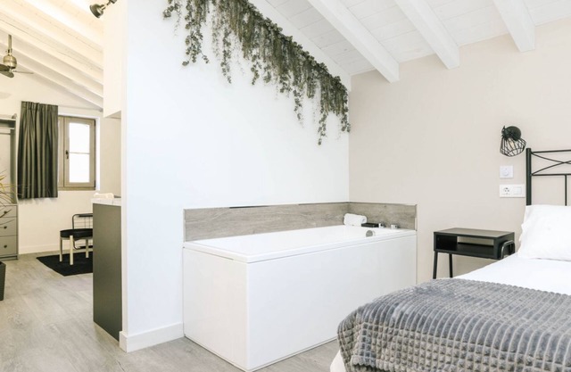 Special studio for couples with individual hydromassage bathtub.