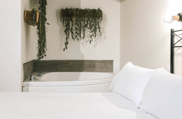 Special studio for couples with double whirlpool tub and balcony.
