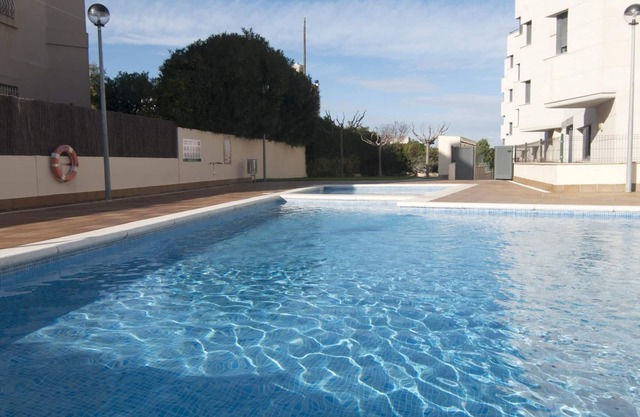Spectacular apartment with communal pool and views of the port