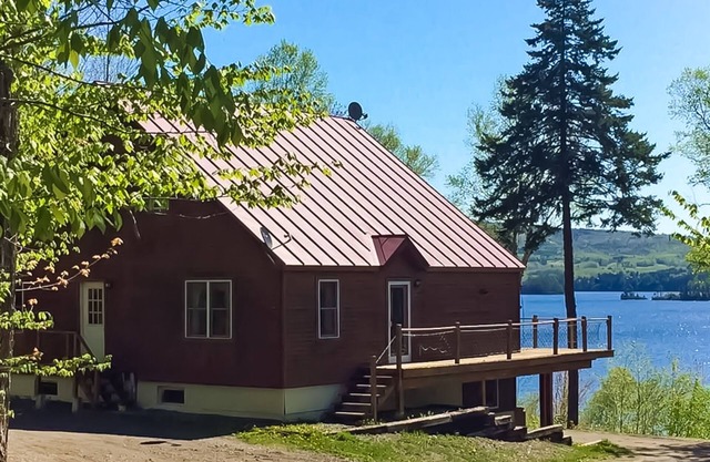 Spectacular lakefront home with dock, firepit, & vaulted ceilings - dog-friendly