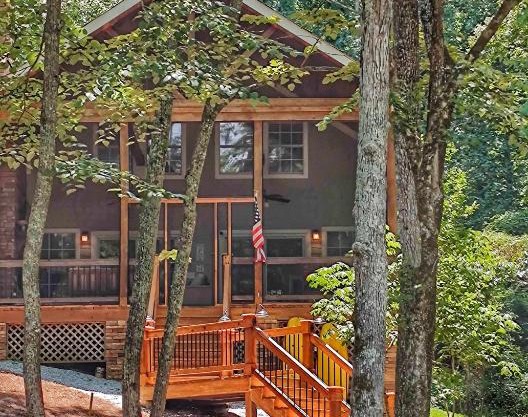 Spectacular porch on Lake Oconee, just a few steps from the water