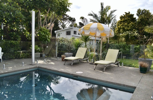 Stanmore Bay apartment with a pool, gorgeous tropical garden & beach close by.