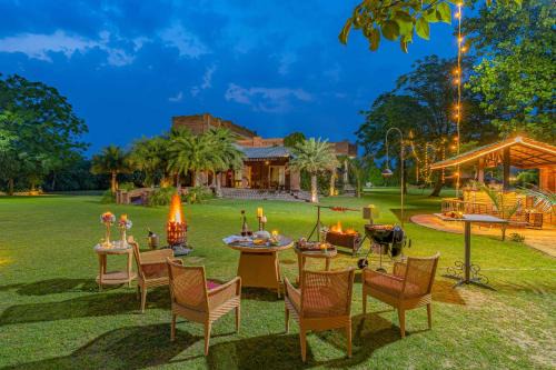 StayVista at Peacocks & Partridges with Amidst Greenery, Terrace, Indoor Fireplace, Bar & Snooker Table