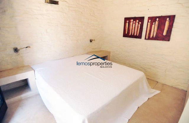Stone built villa with a swimming pool and a fantastic sea view in Koundouros