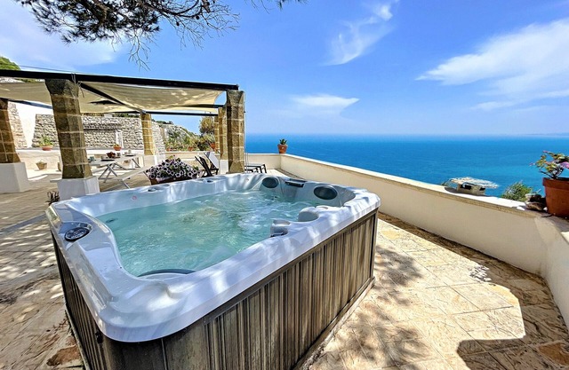 Stone house with outdoor jacuzzi on the cliffs (A)