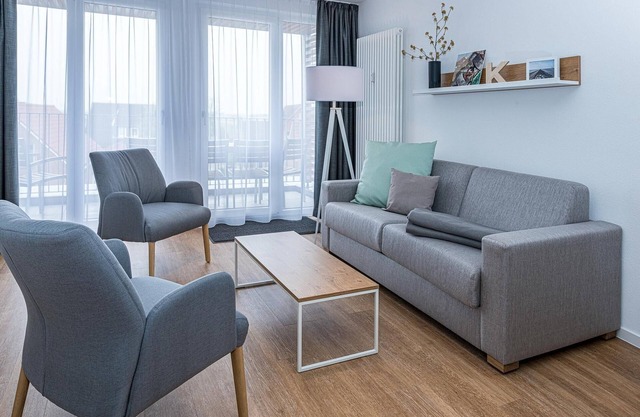 Strandnahes Ferienapartment mit Balkon, Parkplatz, Schwimmbad- & Saunanutzung
