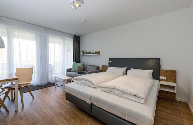 Strandnahes 1-zimmer Apartment mit Balkon, Parkplatz, Schwimmbad- & Saunanutzung