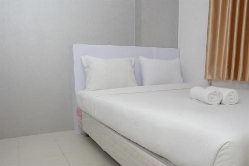 Strategic 2BR at Bassura City Apartment By Travelio