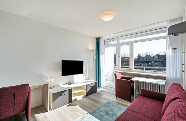 Studio Apartment "Huber Living Basic 203" with Balcony & Wi-Fi