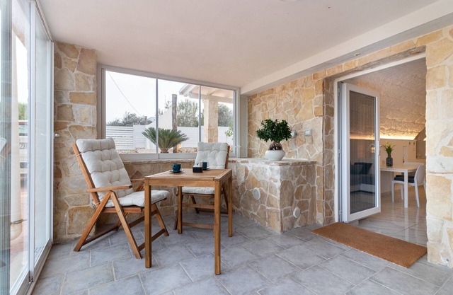 Studio Apartment 'La Porta Sul Mare' with Private Terrace, Wi-Fi and Air Conditioning