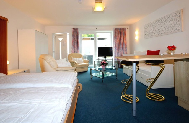 Studio apartment with terrace, own parking space and a small lake 500 m away