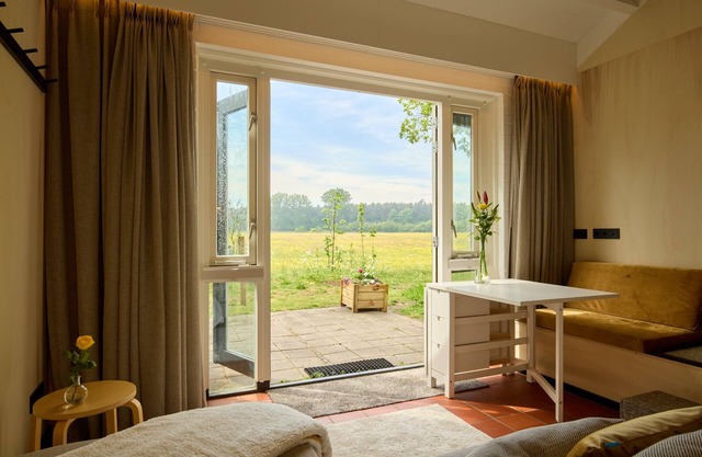 Studio apartment with unobstructed view of meadows and forests near the beach.