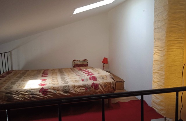 Studio apartment with loft and kitchenette
