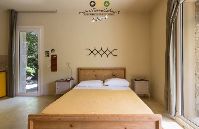 Studio Apartment with kitchenette, patio and private parking
