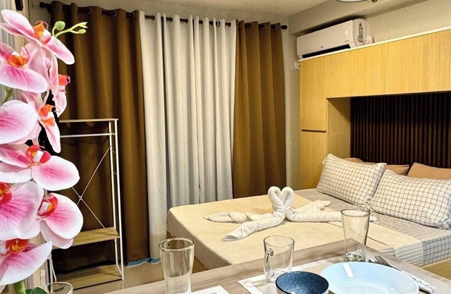 Studio Condo Unit with Balcony Facing Pool near Mactan Airport
