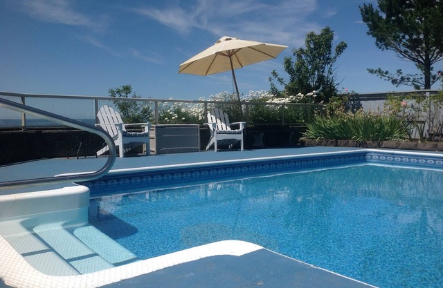 Stunning beach house with pool and hot tub. Pet friendly! Great for families!