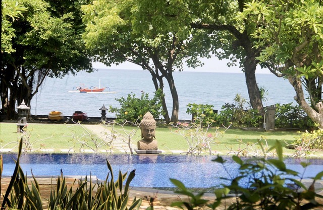Stunning beachfront villa with pool, lush gardens, staff, and top activities!