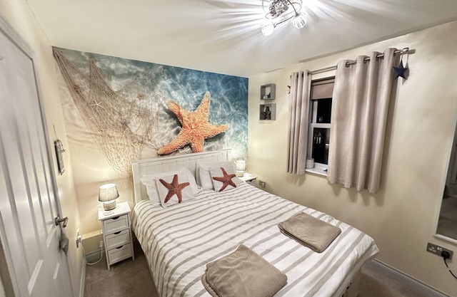 Stunning First Floor Coastal Apartment - Sleeping 4 in 1 Bedroom - Pool and Beach Access Included.