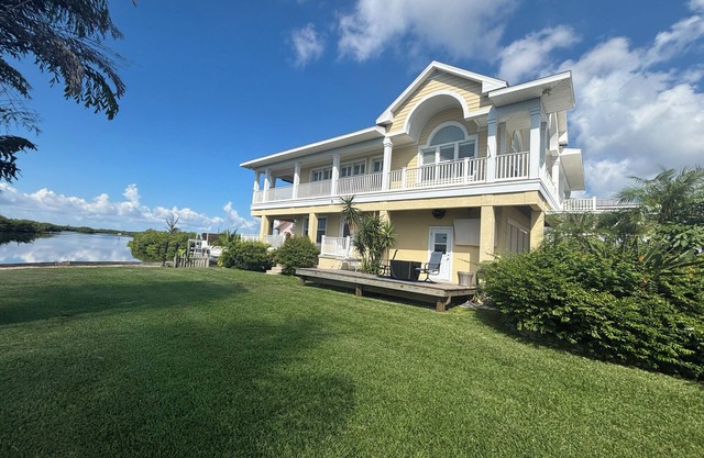 Stunning Key West Style Waterfront Home with Exceptional Views!