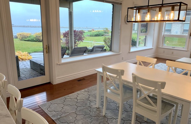STUNNING LAKEFRONT VIEWS. Beautiful, ground floor unit. Lighthouse Point.