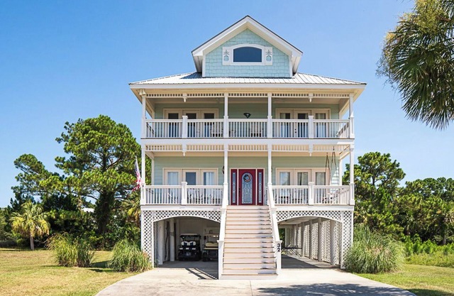 Stunning Marsh Views, 2 Golf Carts Included, 2 Master Suites, expansive decks with ocean breeze