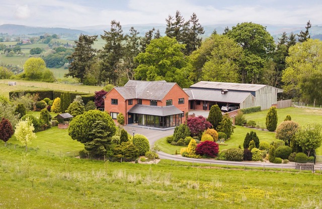 Stunning modern farmhouse retreat perched on a private hilltop in North Wales
