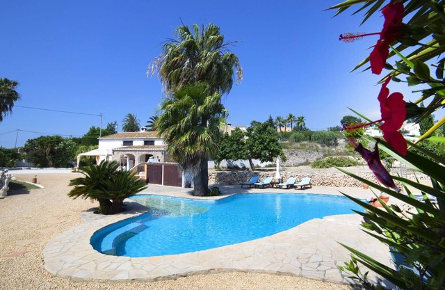 Stunning private villa for 8 guests with hot tub, A/C, WIFI, private pool, TV, patio and parking
