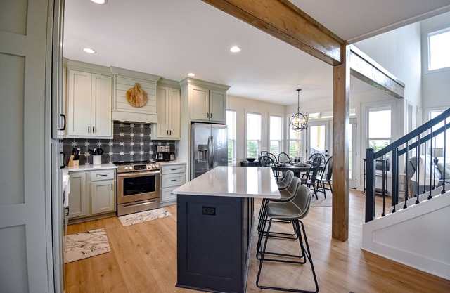 Stunning three-story home with a hot tub, firepit, washer/dryer, & views