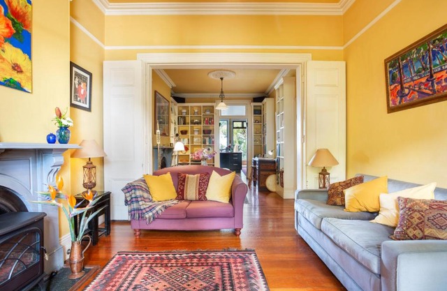 Stunning Victorian Home with Balconies, City Views