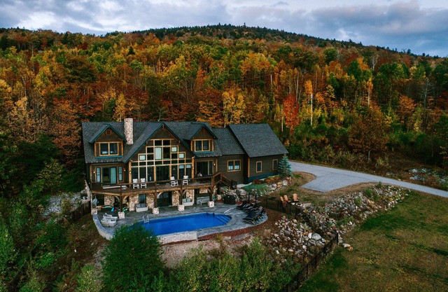 Stunning views, luxurious home, heated pool, hot tub, games