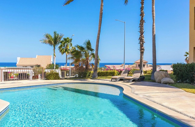 Stylish 2-Bedroom Condo with Ocean Views | Walk to Town | Pool & BBQ Area