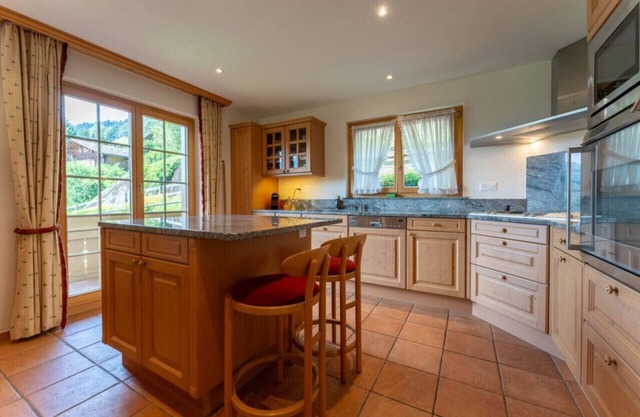 Stylish Alps apartment near Rougemont Village with mountain views.