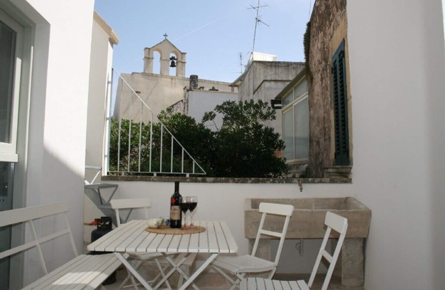 Stylish Art Deco holiday home in historical Baroque old town palazzo, Puglia