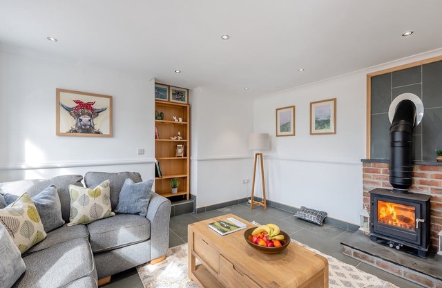 Stylish four-star cottages on a working Devon farm, sleeping up to 14 guests.
