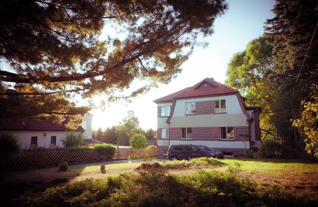 Stylish holiday home with sauna and large garden for groups of up to 9 people.