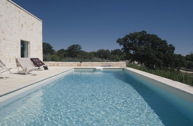 Stylish modern villa with pool, set in 1.5 acres of woodland and olive groves