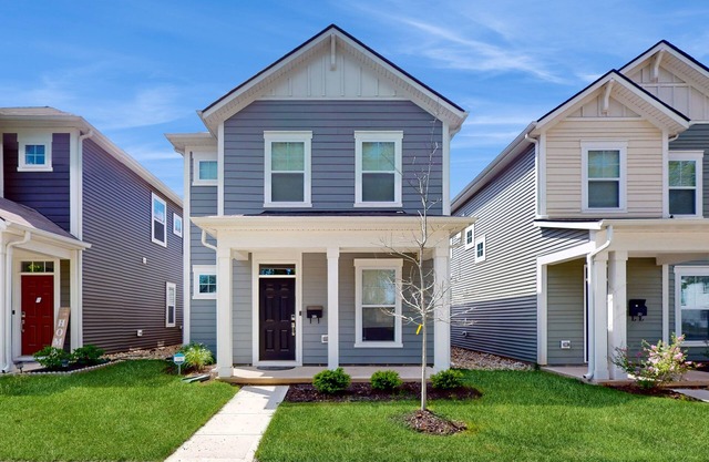 Stylish two-story home with a patio, washer/dryer, & full kitchen